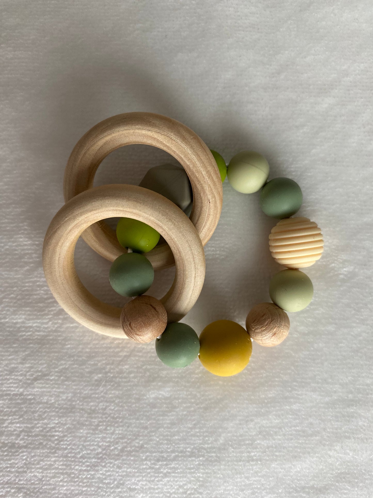 Bijtring groene silicone parels