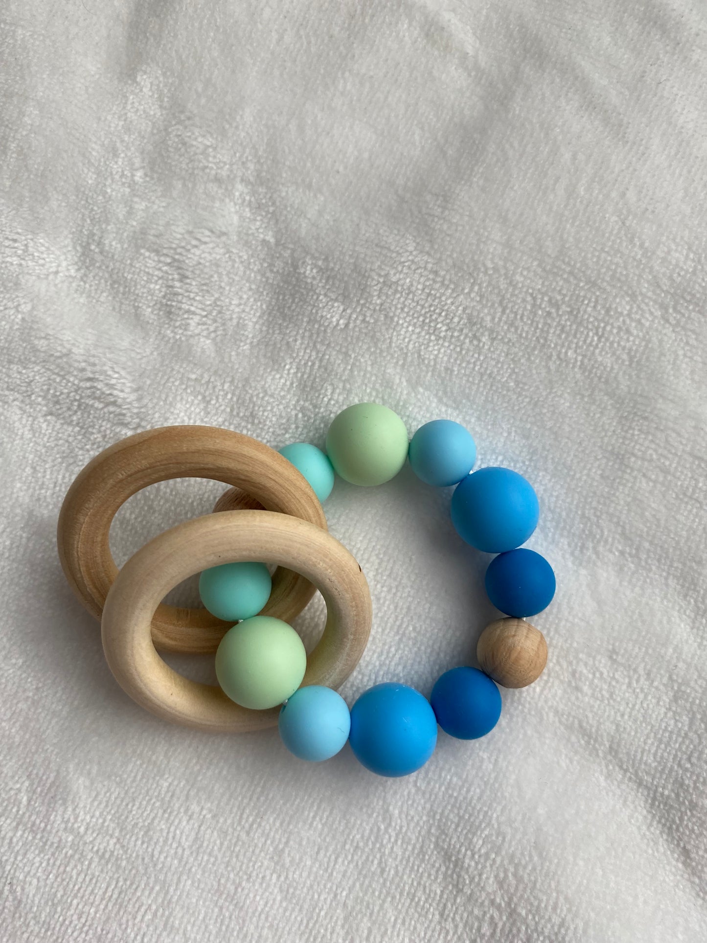 Bijtring blauwe silicone parels