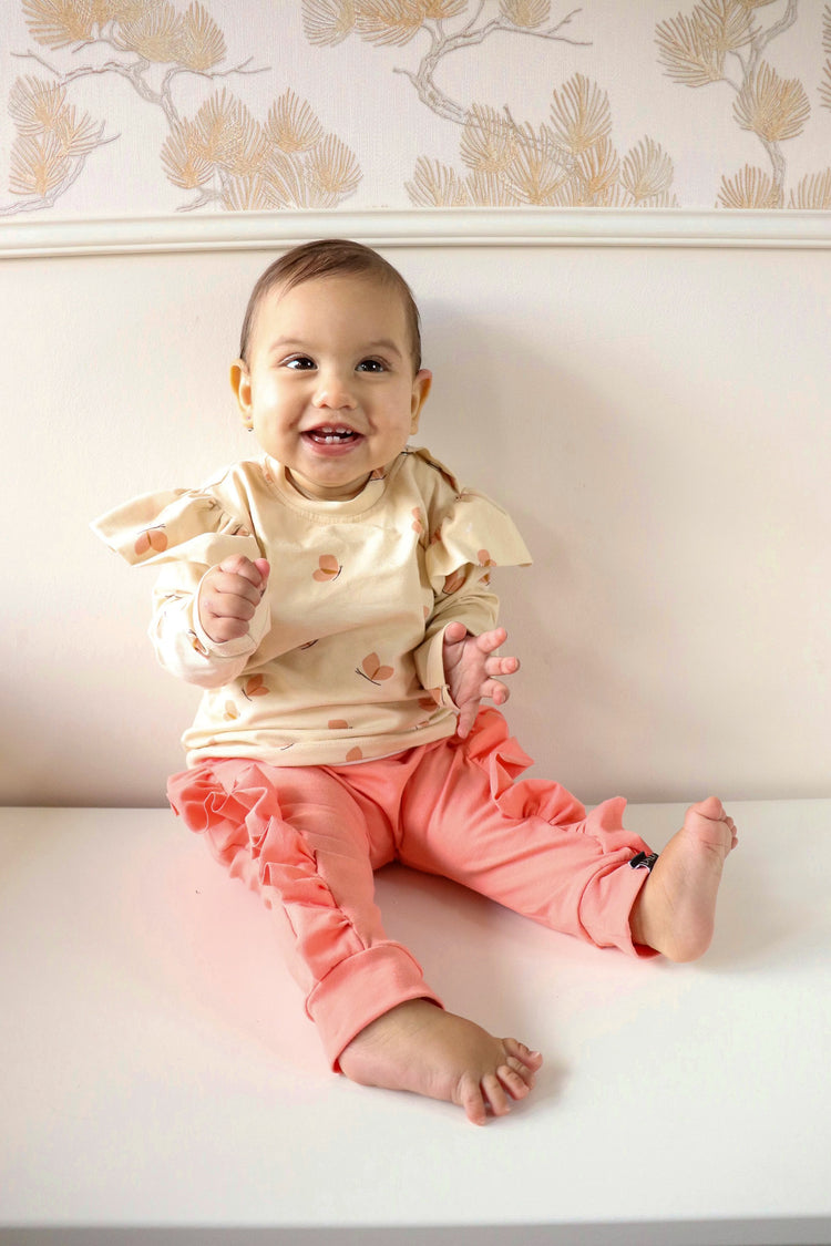 Outfit roze vlindertjes