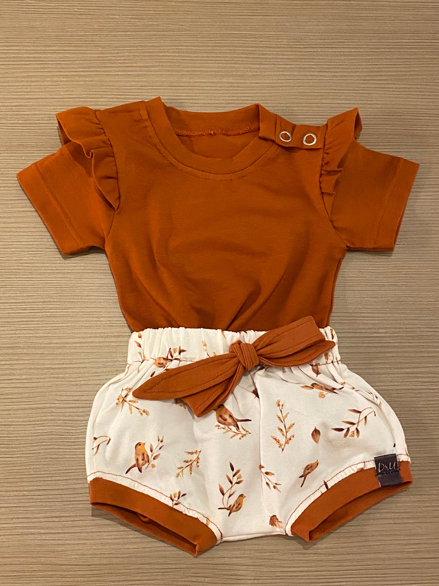 Ruffle romper Brique