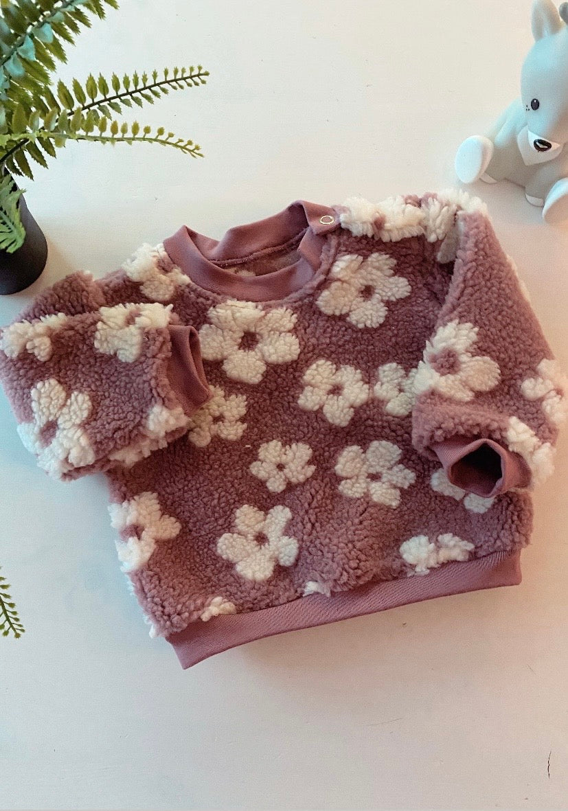 Roze teddy sweater met bloemen