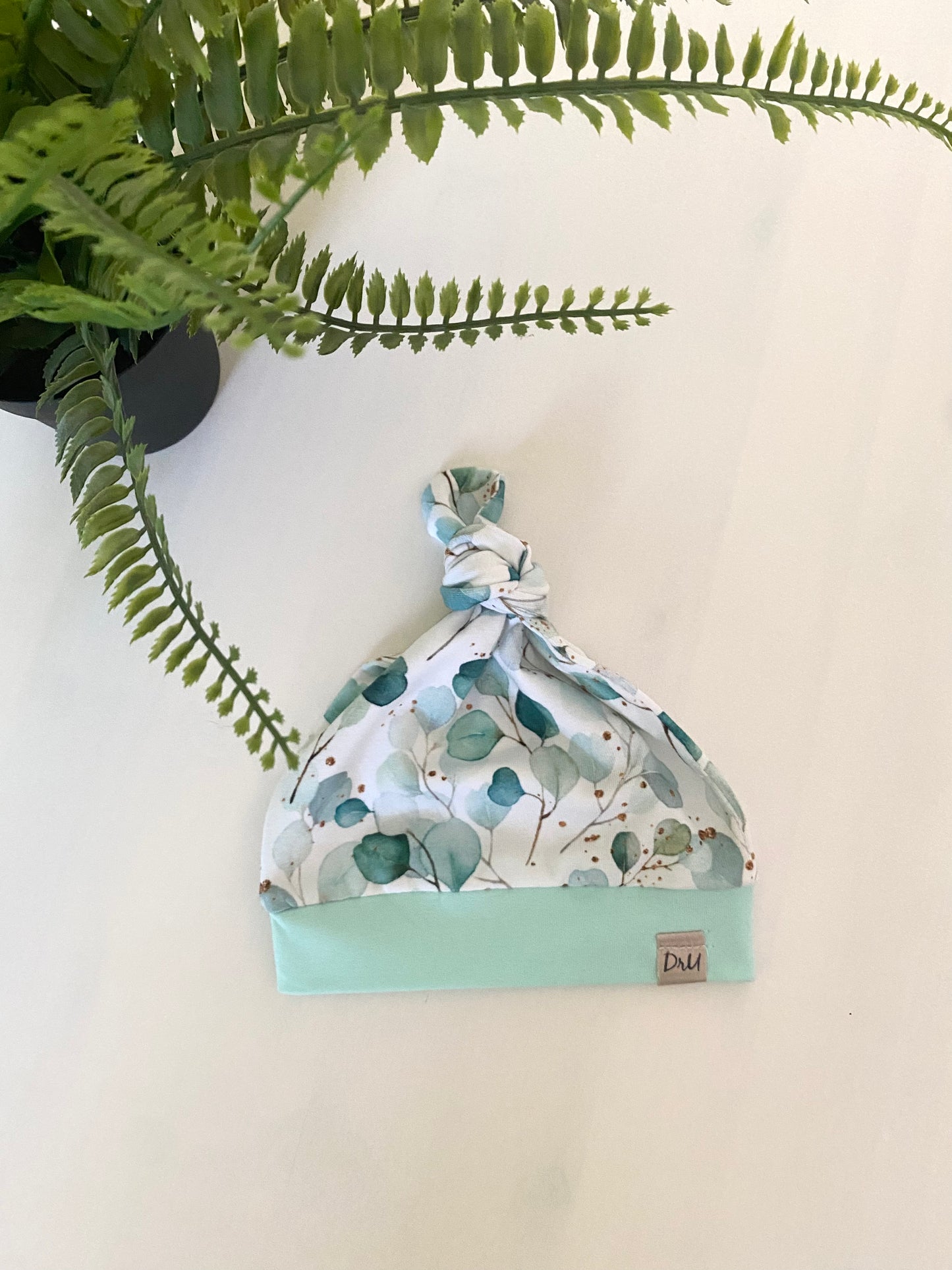 Knot mutsje Eucalyptus